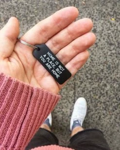 Adam J. Kurtz Home Is Not A Place Keychain Accessories